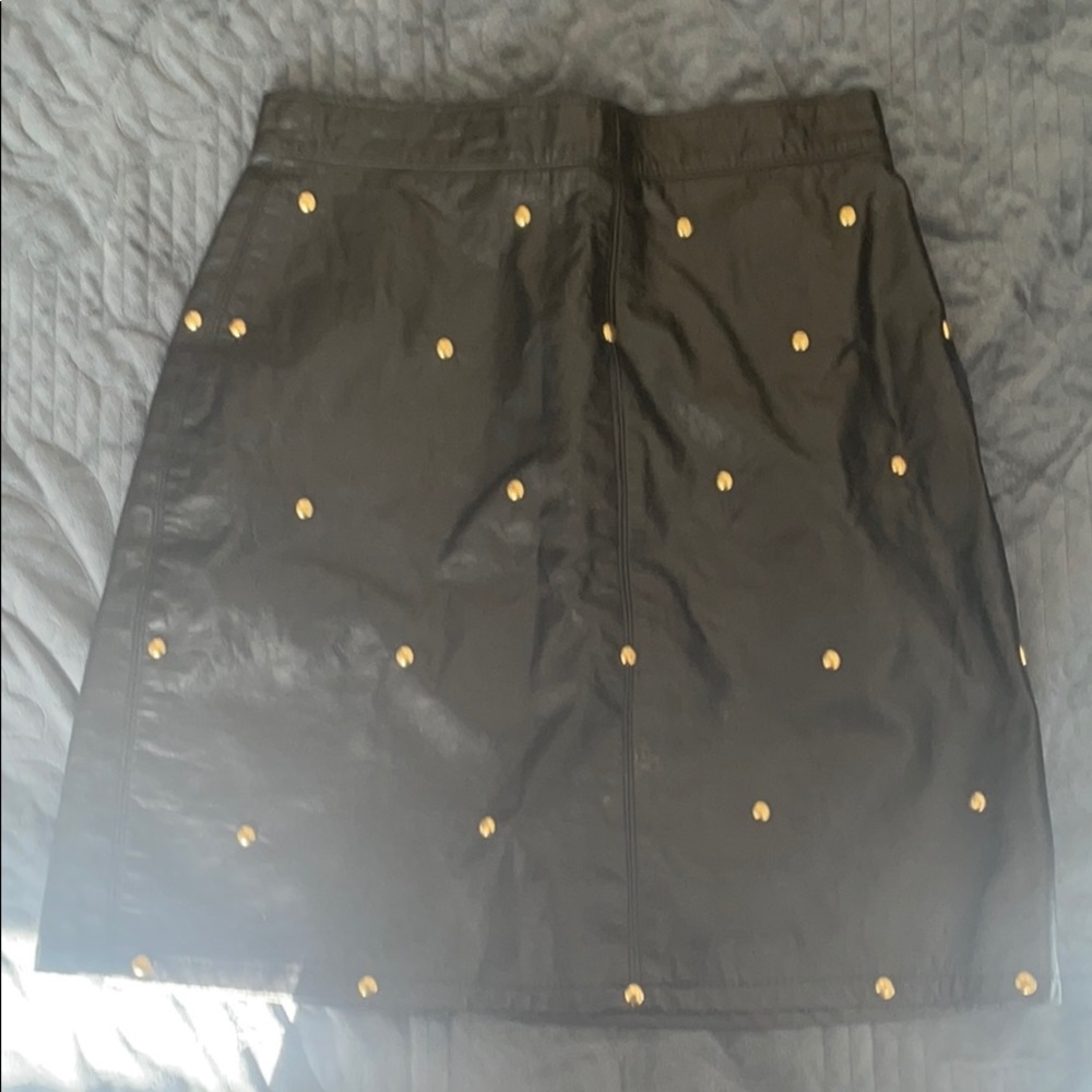 Pleather black mini skirt.